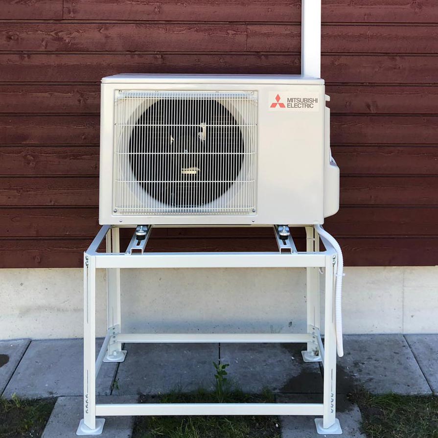 Ilmalämpöpumpun asennus, ulkoyksikön asennus maatelineelle